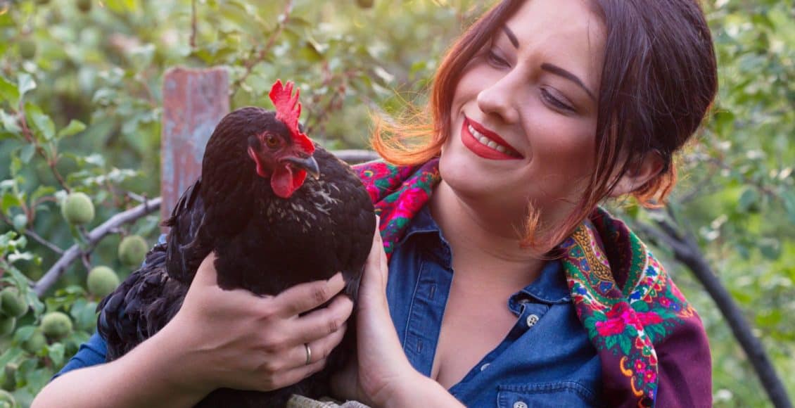 a woman raising urban chickens
