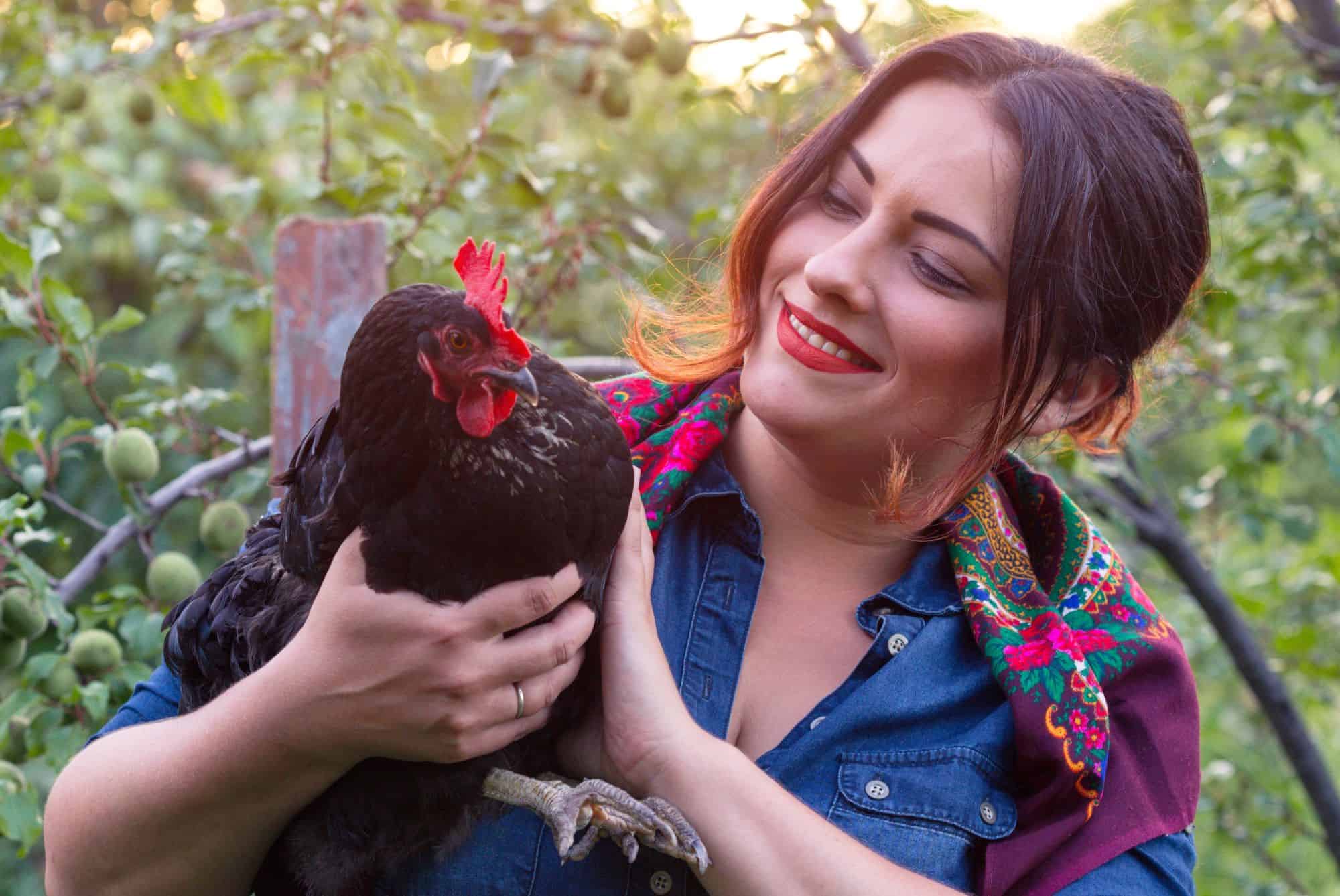 a woman raising urban chickens