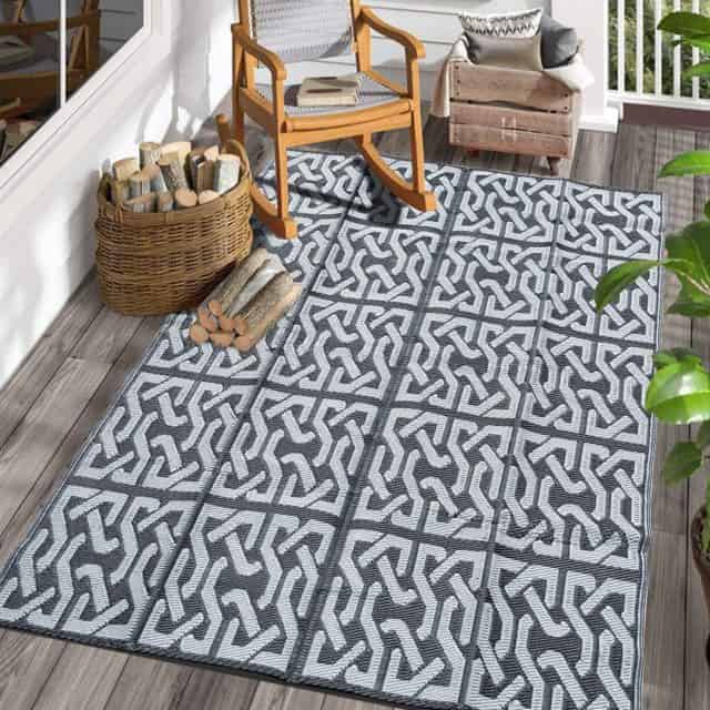 Durable weatherproof rug for outdoor living space.