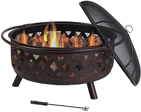 a metal firepit makes it easy to enjoy a backyard fire on a cold day.