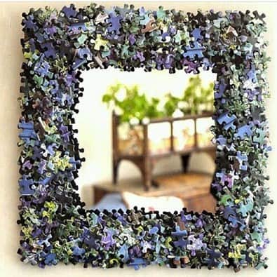 Decorate your home with jigsaw puzzles by making a jigsaw puzzle mirror frame