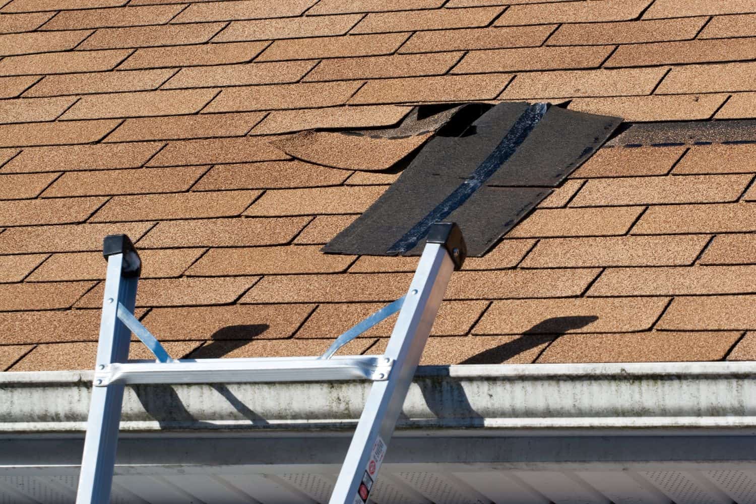 common roof problems include repairing the shingles