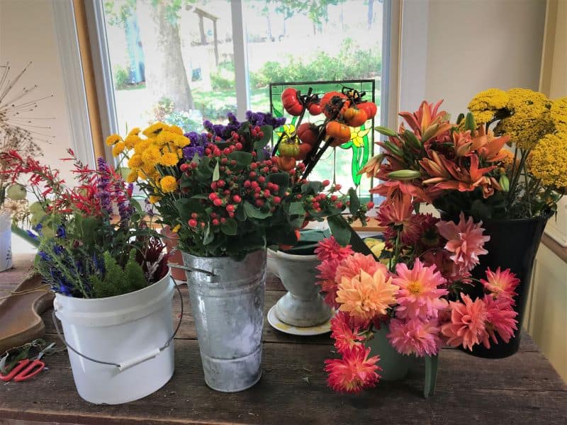 fresh flowers in containers are ready for arranging