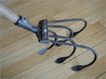 a classic five tine cultivator is a best weeding tool