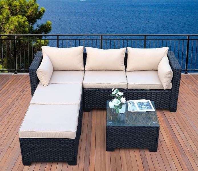 outdoor patio sectional sofa on a wooden deck
