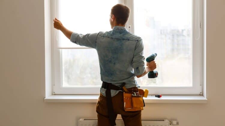 a man doing window replacement