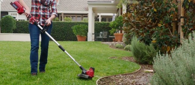 cordless string trimmer in use