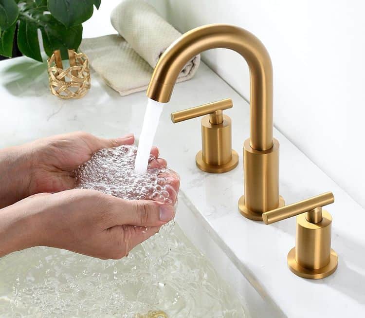 install new double handle bathroom faucet
